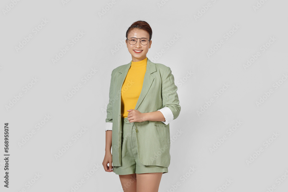 Successful business woman looking confident and smiling Successful business woman looking confident and smiling