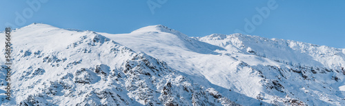 Snowy mountains covered with snow. Sunny winter landscape in Vallter, Setcases, Ripollés, Girona Pyrenees, Catalonia.Winter landscape, wintertime, fairytale scenery, vacations and nature concept.
