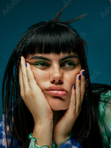 Young woman with bored expression