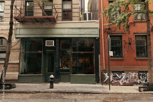 Photography Facade of building with Halloween decor on street in New York City