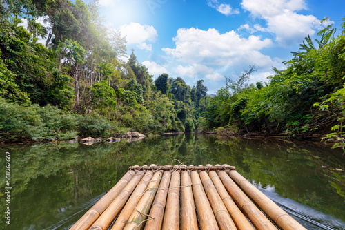 First person view of a bamboo float in a river cruise adventure in the Khao Sok national park, Thailand © moofushi