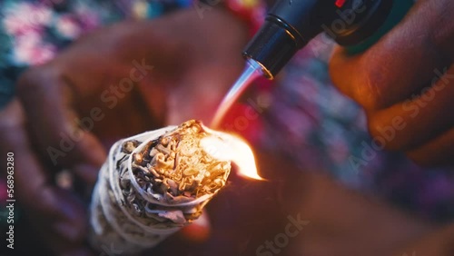Black Stock Footage of calm, meditative, and spiritual elderly Black senior woman in her holistic and zen home filled with African art