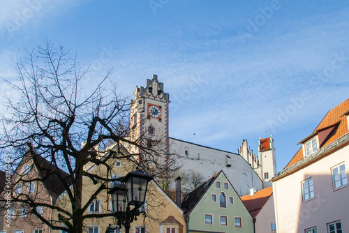Fuessen, Germany - January 14th 2023: Historic housing buildings and the castle in the old town photo