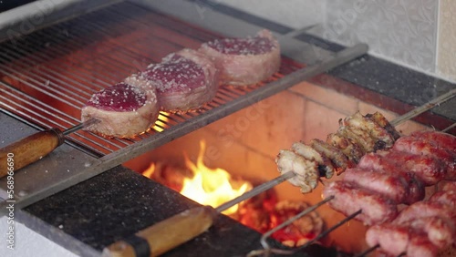 Wallpaper Mural Traditional Churrasco Brazilian Barbecue on the grill in slow motion. Brazilian Food
 Torontodigital.ca