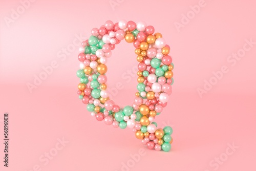 Letter Q made of glass balls, pastel pearls, crystal jewels and gold. photo