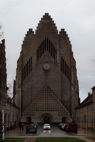 Vertical shot of the front side of a neogothic church - Grundtvigs Kirke in Bispebjerg district Copenhagen, Denmark