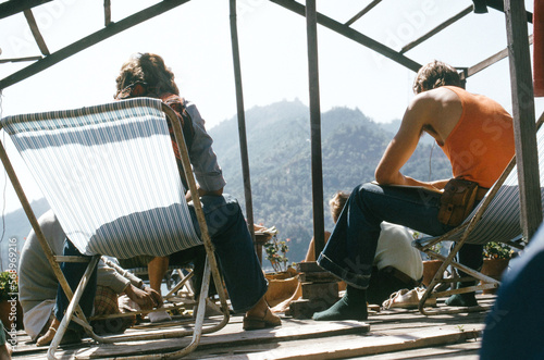 1970s Travelers Hanging Out on Kabul Rooftop photo