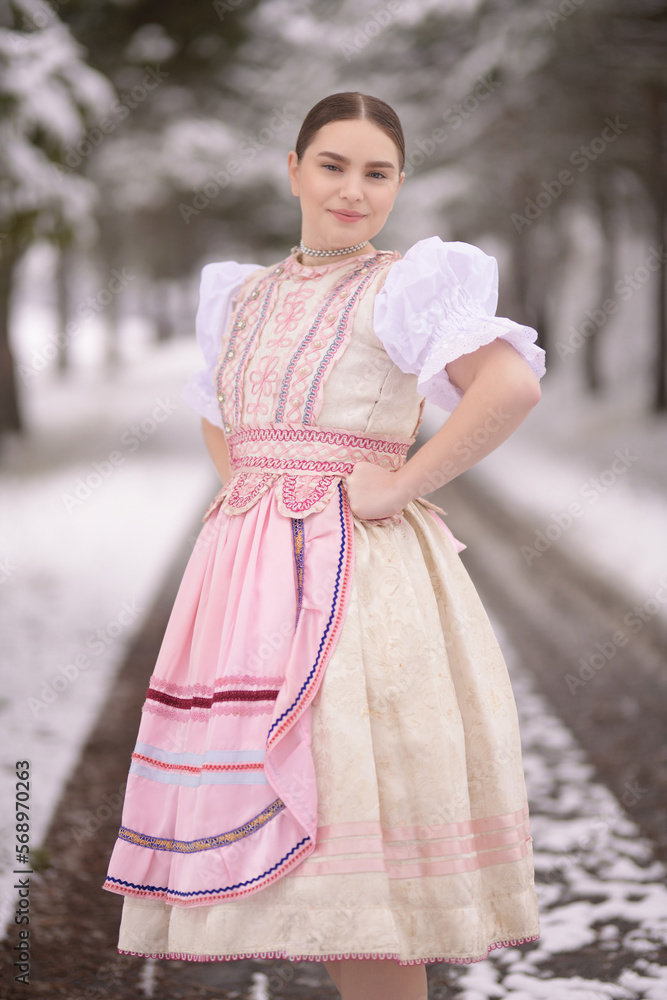 Young beautiful slovak woman in traditional dress. Slovak folklore Young beautiful slovak woman in traditional dress. Slovak folklore