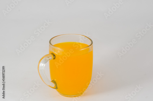 glass of orange juice isolated on a white background