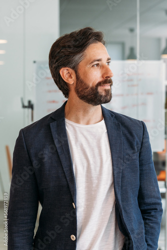 Self confident employee at the office photo