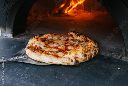Cheese Pizza in Pizza Oven photo