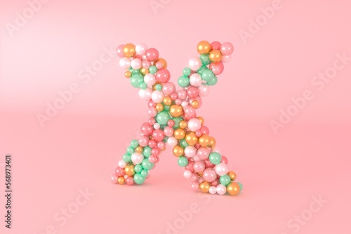 Letter X made of glass balls, pastel pearls, crystal jewels and gold. photo