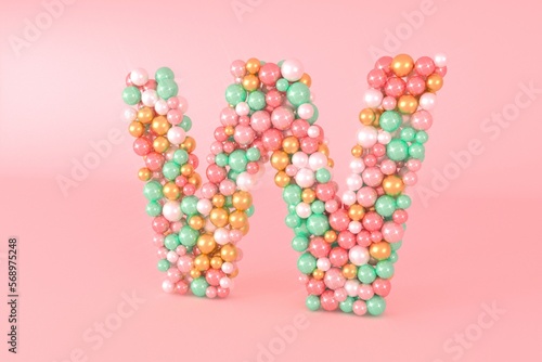 Letter W made of glass balls, pastel pearls, crystal jewels and gold. photo