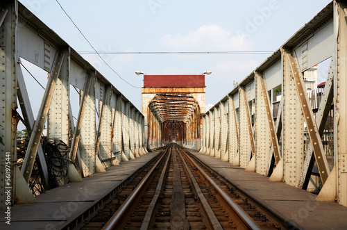 Closeup old old Vietnamese railway bridge, metal building structure photo