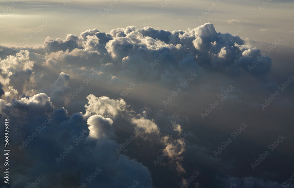 Closeup ethereal dreamy clouds, thousands of miles high in the sky Closeup ethereal dreamy clouds, thousands of miles high in the sky