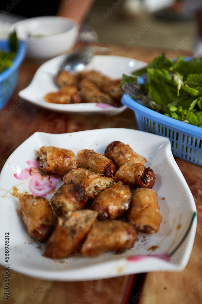 Vietnamese street food, fried spring rolls Vietnamese street food, fried spring rolls