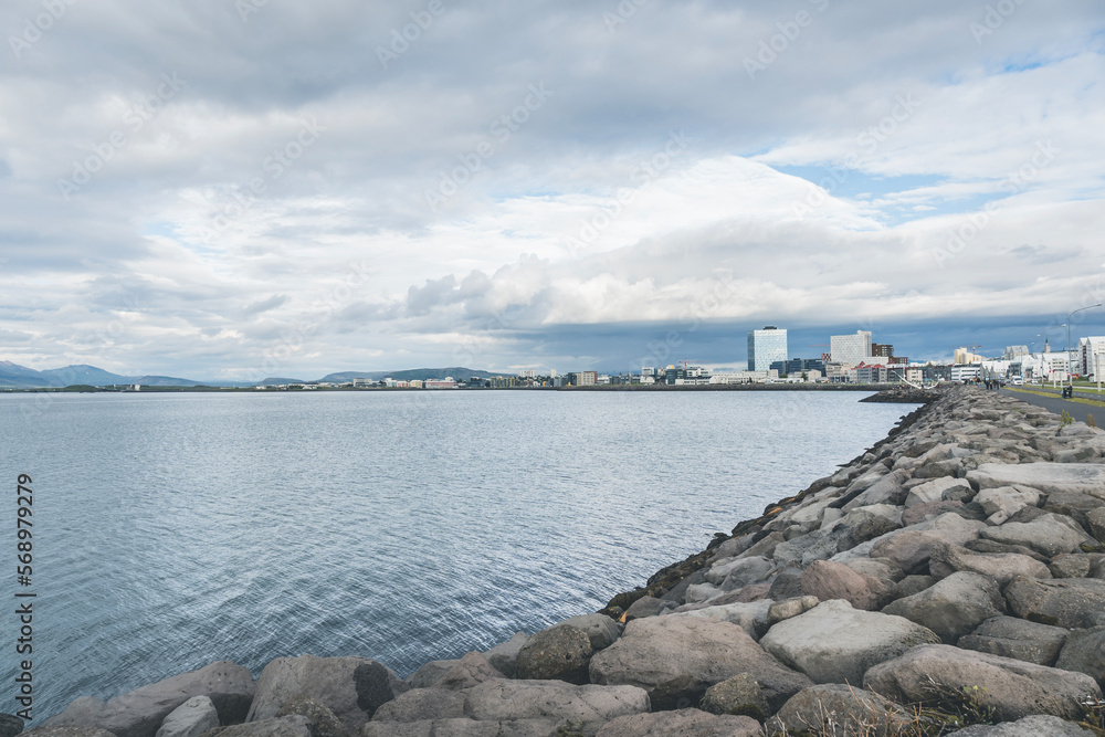 Atlantic Ocean view in part of Reykjavik with buildings along the coast