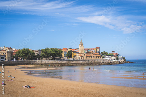 Gijon, Spain - September 1, 2022. Summer evening in San Lorenzo beach in the city of Gijon, Spain