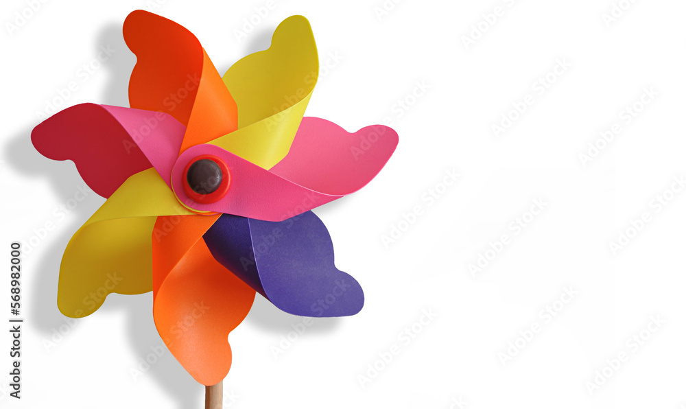 Flat lay Rainbow pinwheel on white background, copy space Flat lay Rainbow pinwheel on white background, copy space