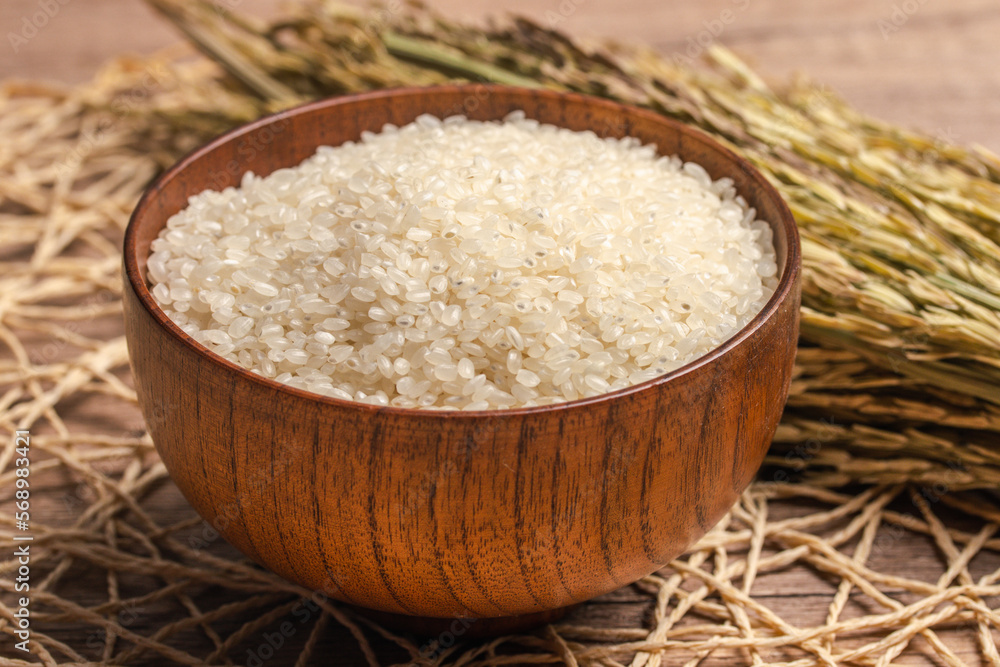 White rice, Masu and ears of rice on a white background