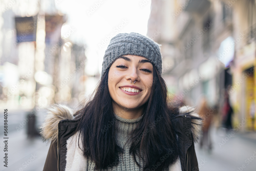 Portrait of a cheerful young woman in winter clothes Portrait of a cheerful young woman in winter clothes