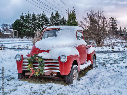 Red Pickup Truck In The Snow
