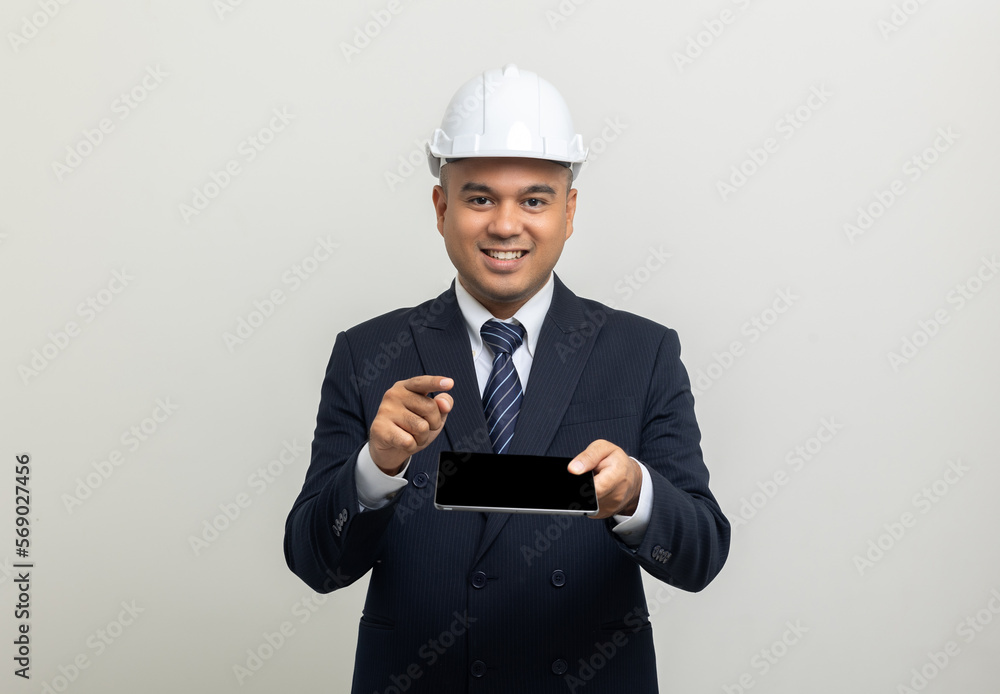 Businessman manager owner real estate working with digital tablet on isolated white background. Cooperation of architect designer. Engineer with safety helmet checking at working construction site Businessman manager owner real estate working with digital tablet on isolated white background. Cooperation of architect designer. Engineer with safety helmet checking at working construction site