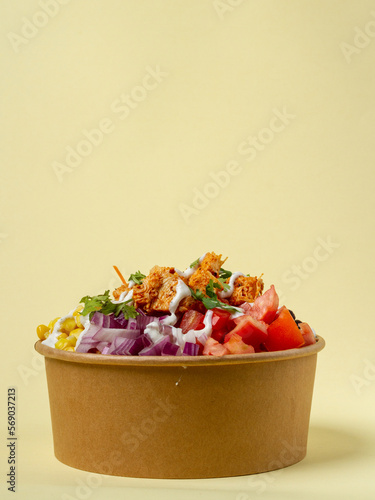 brown rice, cajun chicken, tomato, corn, black beans, carrots, onion, cilantro, and greek yogurt ranch dressing