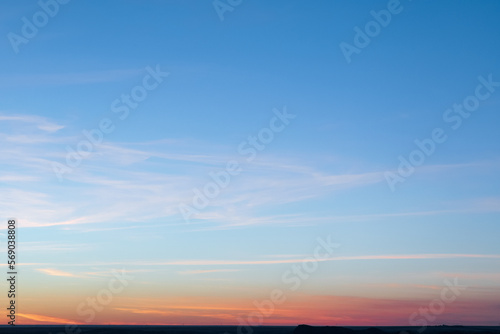 Minimal artistic colorful sunset sky background with horizon line.
