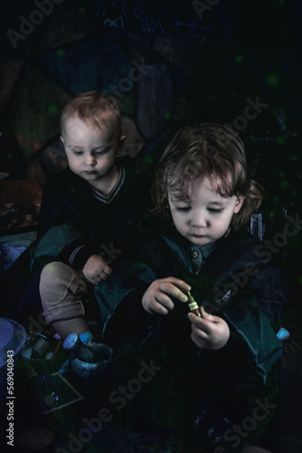 
young slytherin wizards in the dungeon photo