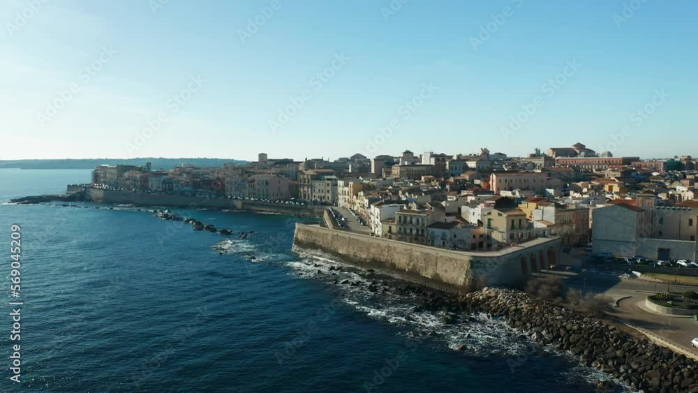 Syracuse, Italy from above with this drone video. Seaport, historic buildings and cultural heritage of the town Syracuse, Italy from above with this drone video. Seaport, historic buildings and cultural heritage of the town