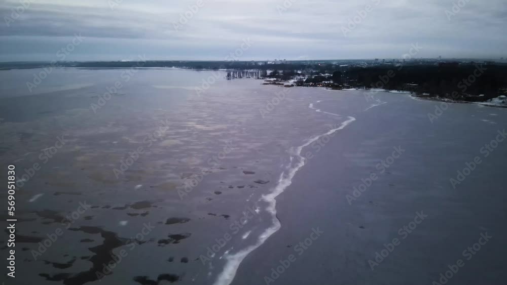 Drone point of view over ice in the lake Drone point of view over ice in the lake