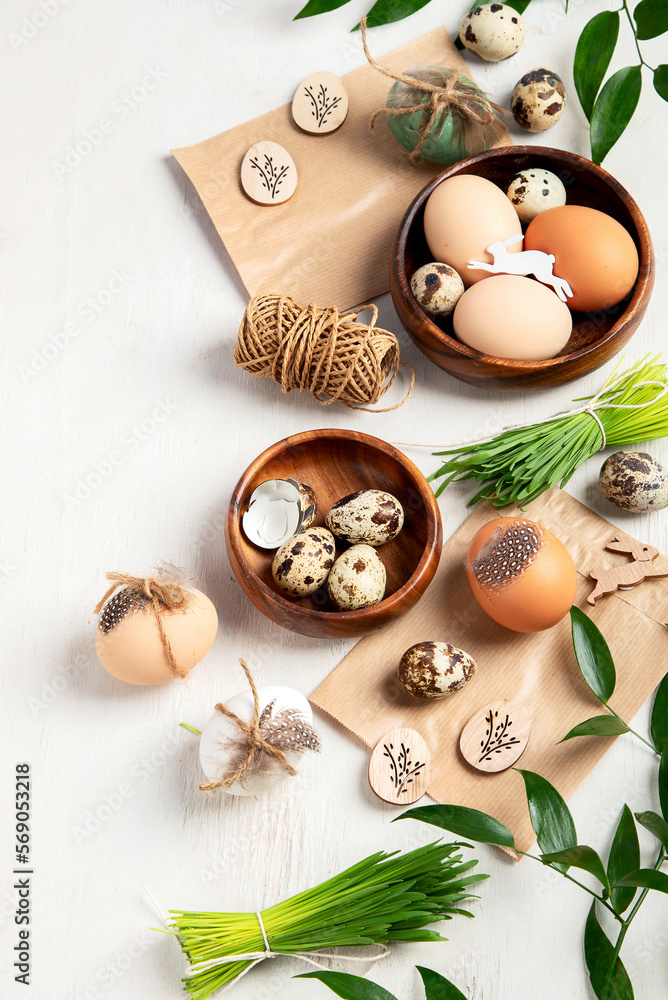 Composition with Easter eggs and green branches. Composition with Easter eggs and green branches.