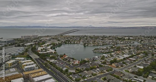 Foster City California Aerial v1 flyover urban residential neighborhood towards lincoln centre life sciences research campus with san mateo bridge and bay views - Shot with Mavic 3 Cine - June 2022 photo
