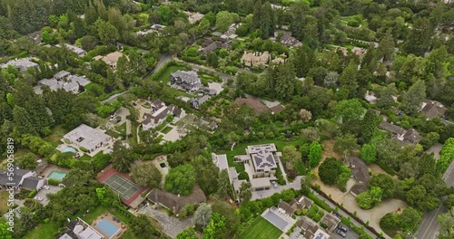 Atherton California Aerial v2 birds eye view flyover wealthiest neighborhood capturing private residential of single family homes in gated community and bay views - Shot with Mavic 3 Cine - June 2022 photo