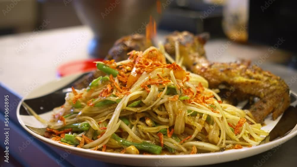 Bean thread noodle stir fry garnished with fried garlic, slow motion close up 4K Bean thread noodle stir fry garnished with fried garlic, slow motion close up 4K