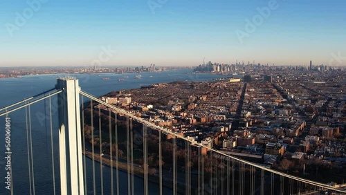 Aerial view over the Verrazzano-Narrows bridge towards the Fort Hamilton cityscape, fall in Brooklyn, NY, USA photo