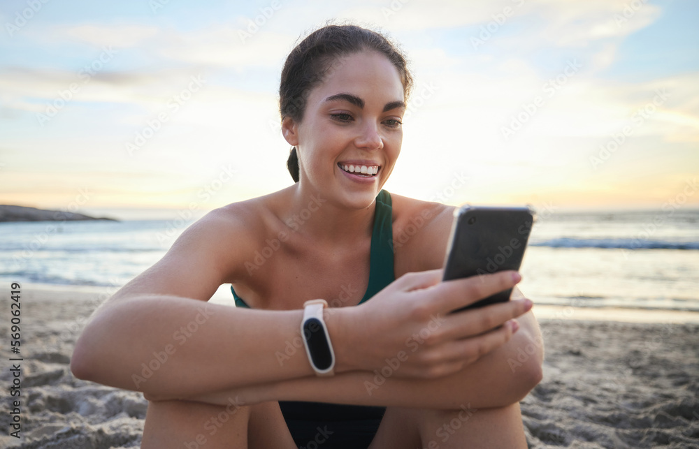 Beach, relax and happy woman on a phone browsing on the internet, online or a mobile app. Happiness, smile and female networking or scrolling on social media with a cellphone by the ocean at sunset.