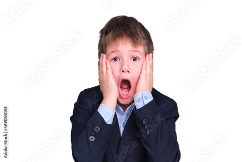 A scared boy in a school suit on distance learning, isolated on a white background