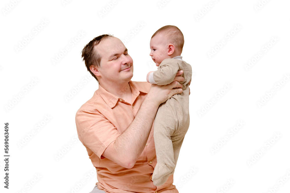 A man father and a boy son play together on the sofa in the home living room, isolated on a white background. Kid aged six months