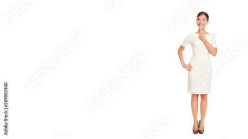 Thinking business woman standing in full body isolated cutout PNG on transparent background contemplating looking up to the side happy. Beautiful Asian / Caucasian businesswoman in dress suit.