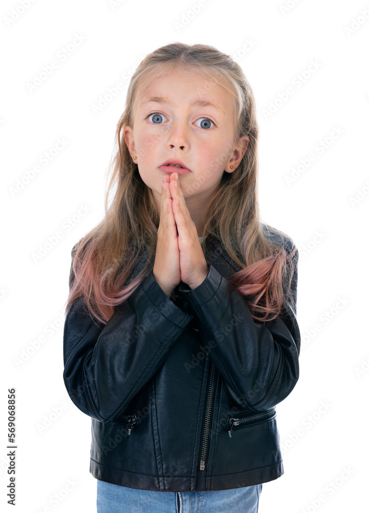 Portrait of regretful five year old girl looks gloomy and desperate, keeps palms together, beggs for forgiveness. Cute blondy child in black leather jacket and blue jeans in studio on white background Portrait of regretful five year old girl looks gloomy and desperate, keeps palms together, beggs for forgiveness. Cute blondy child in black leather jacket and blue jeans in studio on white background