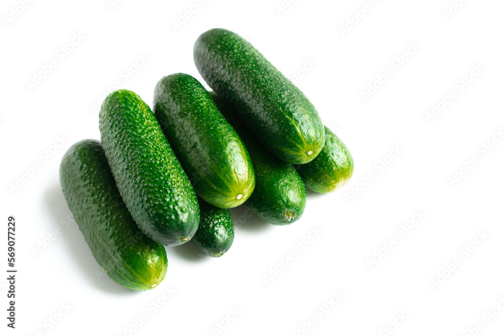 green fresh cucumbers isolated on white background green fresh cucumbers isolated on white background
