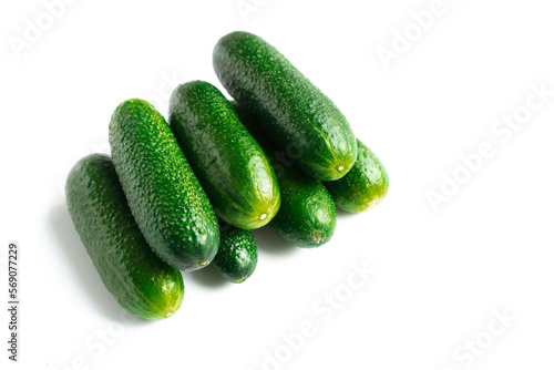 green fresh cucumbers isolated on white background