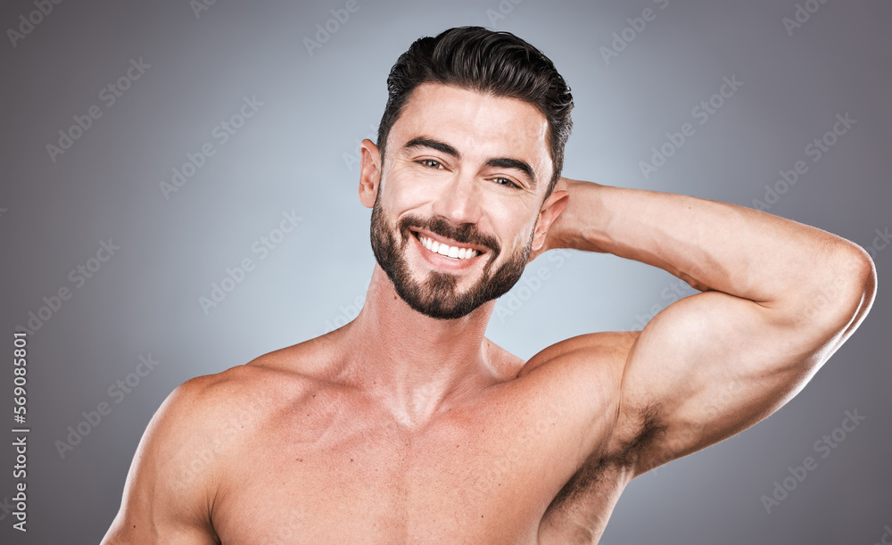 Skincare, smile and portrait of man with hand on head, health and hair or beard maintenance. Fitness, healthy spa facial care and male model with muscle beauty in studio isolated on grey background.