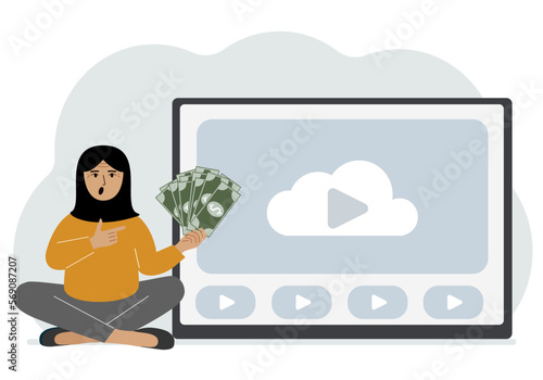 A woman holds paper banknotes in his hand, next to a computer with a video. Freelancer, earning money, working on the Internet, training, coaching, business, remote work.