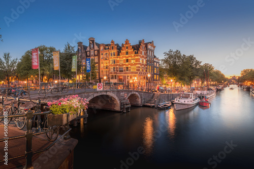 Amsterdam Canals with bridge and Traditional Dutch houses, Netherlands