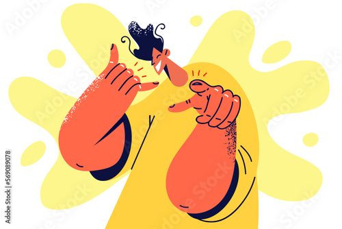 Smiling man with call me gesture point at screen 