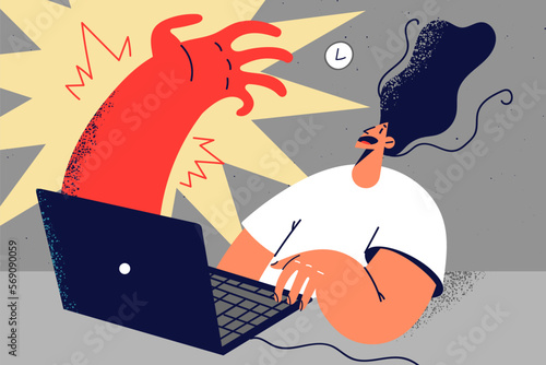 Huge hand appear from laptop 