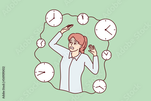 Frightened woman screaming and raising hands standing among clocks symbolizing tough deadlines. Girl panics because of inability to have time to complete work on time